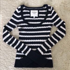 Navy blue and white striped sweater